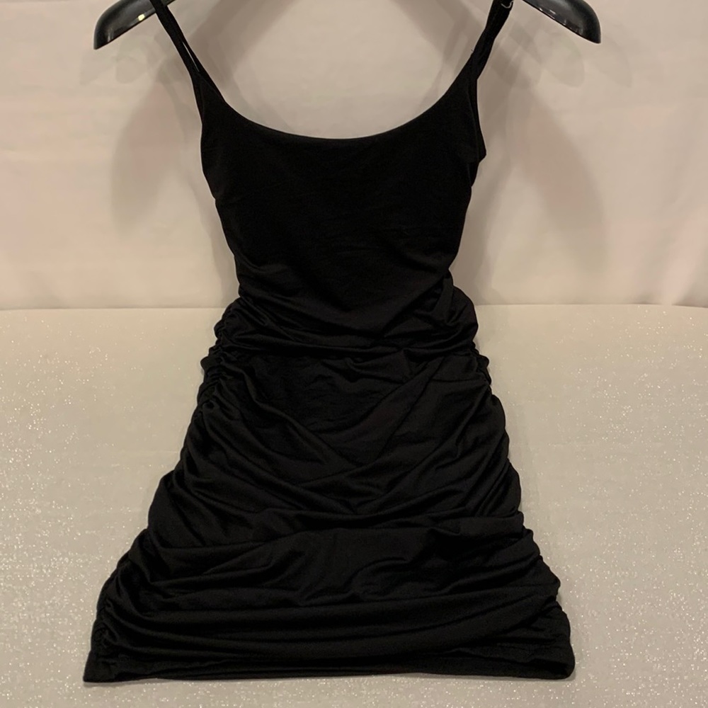 Skinny Black Dress with crisscross back. Size S